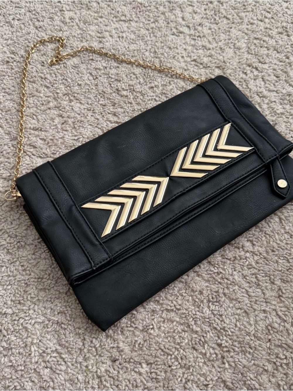 Charming Charlie Black Fold-Over Clutch with Gold Chevron Detail
